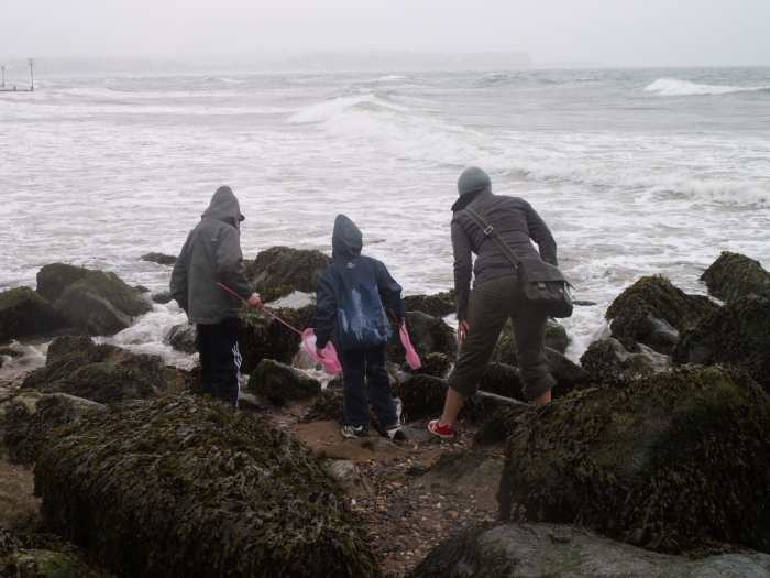 Welcome to Devon and the Bleakest Beach in the World!  Crabbing in the rain on the beach with V's nephews